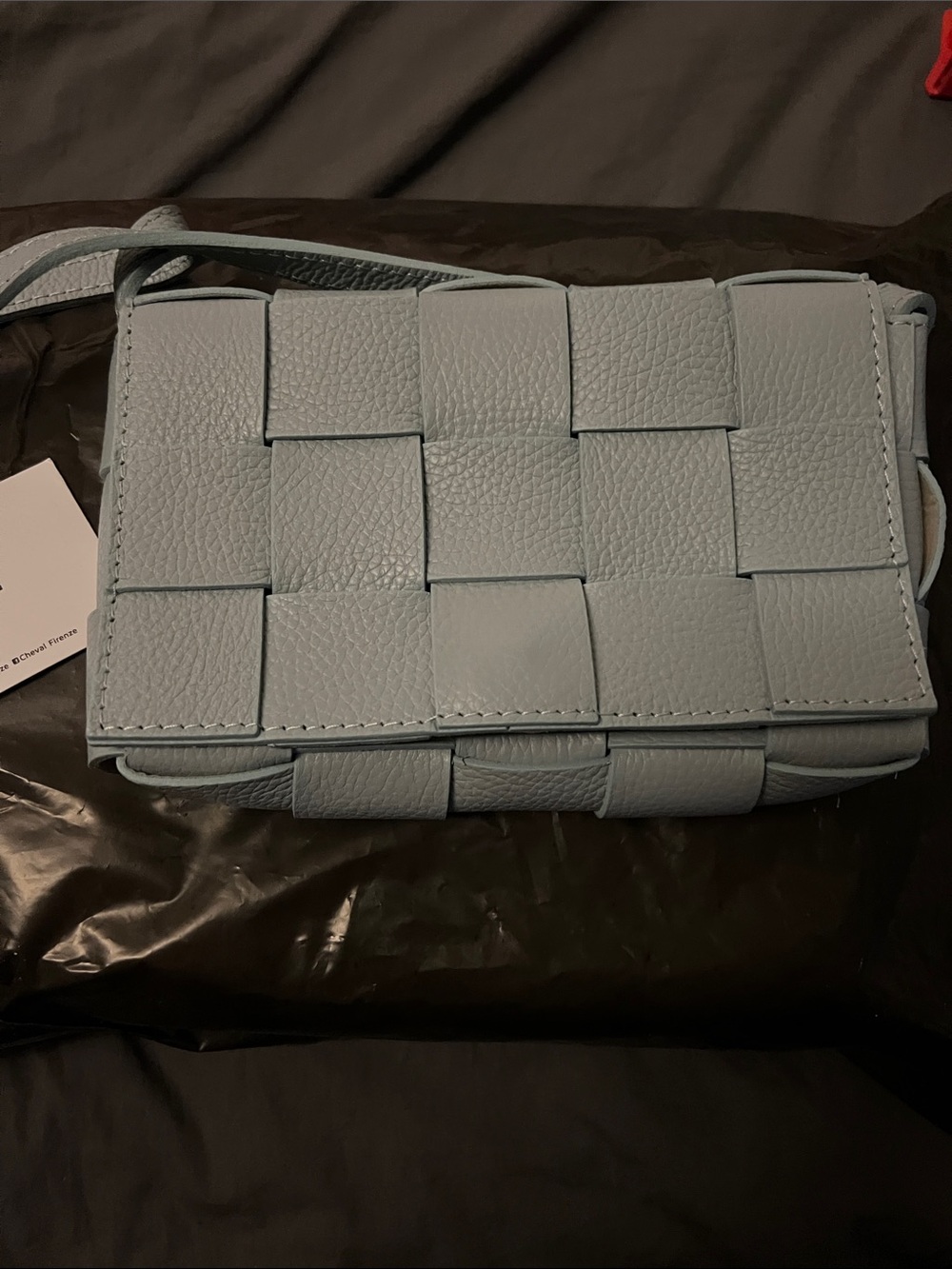 Woven Pebbled Leather Crossbody Bag in Pale Blue 
Cheval Firenze